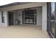 Relaxing screened patio overlooking backyard at 5581 Salem Square S Dr, Palm Harbor, FL 34685