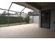 Spacious screened patio perfect for relaxing outdoors at 5581 Salem Square S Dr, Palm Harbor, FL 34685