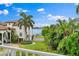 View of waterfront property with private basketball court at 608 Columbus Dr, Tierra Verde, FL 33715