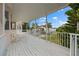 Spacious balcony overlooking water and other homes at 608 Columbus Dr, Tierra Verde, FL 33715