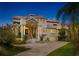 Magnificent home with a grand entrance, columns and a large driveway at 608 Columbus Dr, Tierra Verde, FL 33715