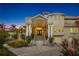 Stunning home featuring a grand entrance and a beautifully landscaped yard at 608 Columbus Dr, Tierra Verde, FL 33715
