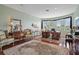 Spacious home office with large windows and wood floors at 608 Columbus Dr, Tierra Verde, FL 33715