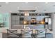 Island kitchen with stainless steel appliances and lots of counter space at 608 Columbus Dr, Tierra Verde, FL 33715