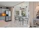 Kitchen nook with a charming table and chairs, offering a view of the outdoors at 608 Columbus Dr, Tierra Verde, FL 33715