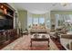 Relaxing living room with comfortable seating and bay window at 608 Columbus Dr, Tierra Verde, FL 33715