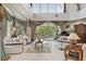 Spacious living room with high ceilings and ample natural light at 608 Columbus Dr, Tierra Verde, FL 33715