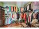 Large walk-in closet with ample hanging space and shelving at 608 Columbus Dr, Tierra Verde, FL 33715