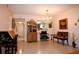 Bright dining room with chandelier and antique furniture at 6472 Seagull Dr # 303, Bradenton, FL 34210