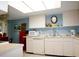 Efficient kitchen with white cabinets and appliances at 6472 Seagull Dr # 303, Bradenton, FL 34210