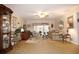 Living room with access to screened porch and plenty of light at 6472 Seagull Dr # 303, Bradenton, FL 34210