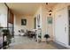Cozy screened porch with seating and plants at 6472 Seagull Dr # 303, Bradenton, FL 34210