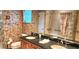 Bathroom with double vanity, shower, and bathtub at 6773 14Th N Ave, St Petersburg, FL 33710
