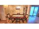 Dining room with hardwood floors and a classic wooden table at 6773 14Th N Ave, St Petersburg, FL 33710