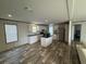 Modern kitchen with island and stainless steel appliances at 7337 Desant Ln, Port Charlotte, FL 33981