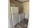 Laundry room with washer and dryer at 7337 Desant Ln, Port Charlotte, FL 33981
