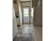 Laundry room with washer, dryer, and exterior access at 7337 Desant Ln, Port Charlotte, FL 33981