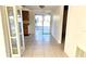 Dining room with tile floors and sliding glass doors at 9116 Chantilly Ln, Port Richey, FL 34668