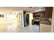 Kitchen with stainless steel appliances and wood cabinets at 9116 Chantilly Ln, Port Richey, FL 34668