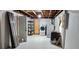 Laundry room with washer, dryer and storage shelves at 9116 Chantilly Ln, Port Richey, FL 34668