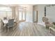 Elegant dining room with a chandelier and hardwood floors at 23635 Oakside Blvd, Lutz, FL 33559