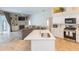 Modern kitchen with stainless steel appliances and a large island at 23635 Oakside Blvd, Lutz, FL 33559