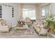 Living room with ornate furniture and a large mirror at 23635 Oakside Blvd, Lutz, FL 33559