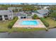 Community pool and surrounding area from above at 11201 122Nd Ave # 204, Largo, FL 33778