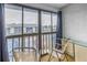 Private balcony with seating for two and a view of the community at 11201 122Nd Ave # 204, Largo, FL 33778