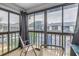 Private balcony with seating for two and a view of the community at 11201 122Nd Ave # 204, Largo, FL 33778