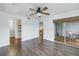 Bedroom with laminate floors, a door to a balcony, and a large closet at 11201 122Nd Ave # 204, Largo, FL 33778