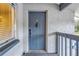 Gray front door with keypad entry and window at 11201 122Nd Ave # 204, Largo, FL 33778