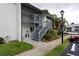 Condo building exterior showing stairs and walkway at 11201 122Nd Ave # 204, Largo, FL 33778