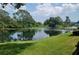 Serene lakefront property with lush landscape at 11201 122Nd Ave # 204, Largo, FL 33778