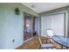Relaxing lanai with glass sliding doors and seating area at 11201 122Nd Ave # 204, Largo, FL 33778
