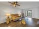Living room with reclining sofa and a glass-top coffee table at 11201 122Nd Ave # 204, Largo, FL 33778