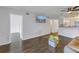 Living room with dark wood floors and a view of another room at 11201 122Nd Ave # 204, Largo, FL 33778