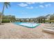 Refreshing community pool with lounge chairs at 11201 122Nd Ave # 204, Largo, FL 33778
