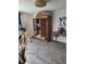 Bedroom with wooden armoire and desk at 16108 5Th E St, Redington Beach, FL 33708