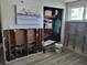 Unfinished closet with shelving and some stored items at 16108 5Th E St, Redington Beach, FL 33708