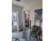 Dining room with damaged wall and furniture at 16108 5Th E St, Redington Beach, FL 33708