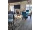 Living room with fireplace and water view at 16108 5Th E St, Redington Beach, FL 33708