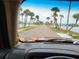 View of tree-lined street in waterfront community at 16108 5Th E St, Redington Beach, FL 33708