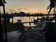 Relaxing patio furniture with waterfront view at 16108 5Th E St, Redington Beach, FL 33708