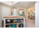 Kitchen island with butcher block top and open shelving at 1615 Leland Dr, Sun City Center, FL 33573