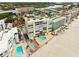 Aerial view of beachfront building, highlighting its features and surrounding area at 19450 Gulf Blvd # 401, Indian Shores, FL 33785