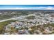 Aerial view of community with waterfront access, tennis courts, and playground at 2058 Sheffield Ct, Oldsmar, FL 34677