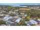 Aerial view showcasing community, pool, and nearby park at 2058 Sheffield Ct, Oldsmar, FL 34677