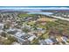 Aerial view of community near waterfront with pool and park at 2058 Sheffield Ct, Oldsmar, FL 34677