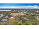 Aerial view showing community amenities including tennis courts and playground at 2058 Sheffield Ct, Oldsmar, FL 34677